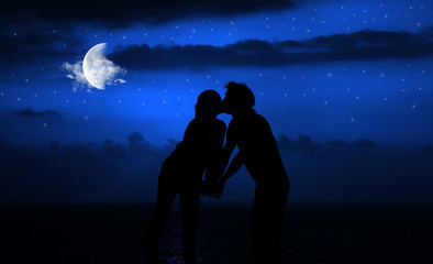 Romantic night kiss