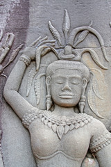 Fototapeta na wymiar Apsara - bas-relief in Angkor area