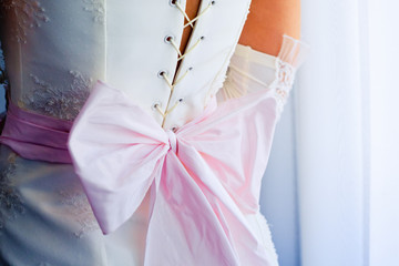 Image of back of bride in wedding dress