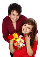 Fototapeta na wymiar mother and daughter with flowers