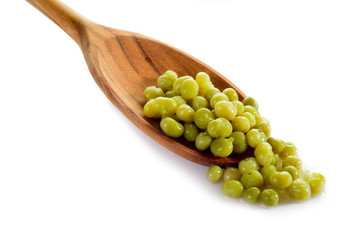 peas over spoon - piselli su cucchiaio
