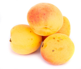 Apricots on a white background