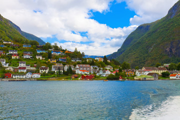 Fototapeta na wymiar Mountain village in fjords, Norway