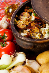 Baked potato in clay pot