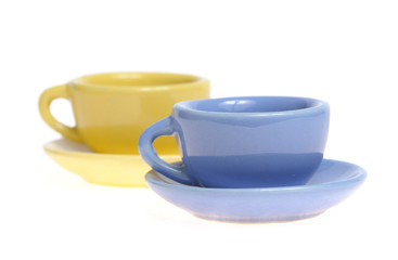 Two mugs with saucer
