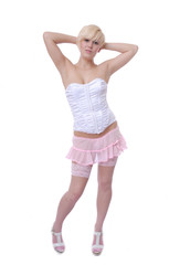 Pretty blond posing in basque and stockings