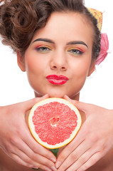 Close up portrait of beauty woman with grapefruit