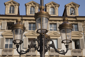 Fototapeta na wymiar Lamppost and Facades, Turin, Italy