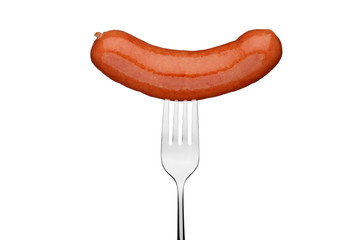 Close up of sausage and fork isolated on white background