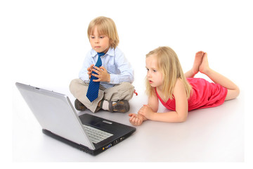 children with laptop isolated on white