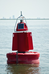Buoy marking the navigable depth in the Netherlands. - obrazy, fototapety, plakaty