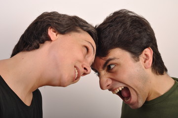 Woman and man yelling face to face
