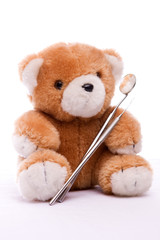 Teddy mit Zahnarztinstrumenten II