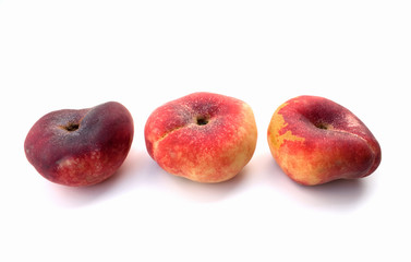 Three donut peaches (close up)
