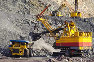 Extraction of Iron ore in Career.  Pit  Dozer Quarry Transport Loading Excavate Mining Digging Load Rock Mine