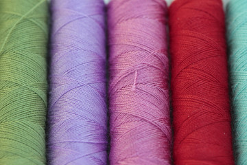 spools of many colors of thread