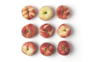 Whole wild flat peaches