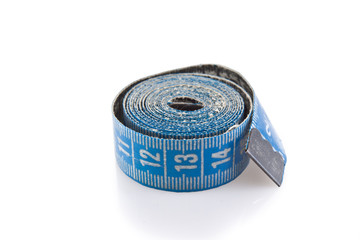 used blue measuring tape isolated on white