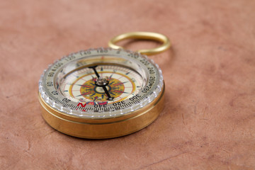 Fototapeta na wymiar old paper and compass