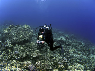 Woman Underwater Photographer Scuba Diving in Kona Hawaii