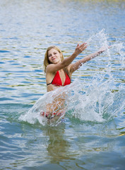 Fototapeta premium girl making water sparks