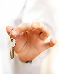 Hand holding keys