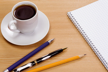 cup of coffee and notebook