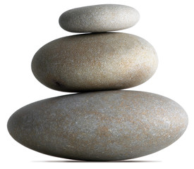 Fototapeta na wymiar three pebbles balancing on each other on a white background