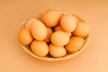 Basket of eggs on the colourful background