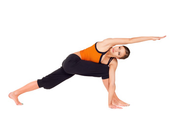 Naklejka premium Young Fit Woman Practicing Yoga