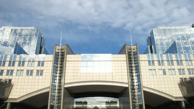 Time lapse clouds over European Parliament, Brussels
