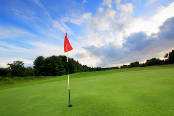 Rolgordijnen Golf course with amazing clouds © JulietPhotography