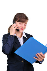 Attractive businesswoman with cellphone and folders