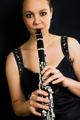 Young beautiful clarinetist