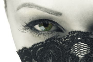 The woman's face with beautiful green eye