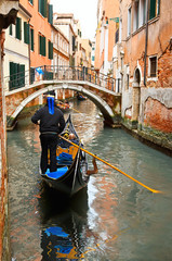Fototapeta premium Gondolas on canal in Venice