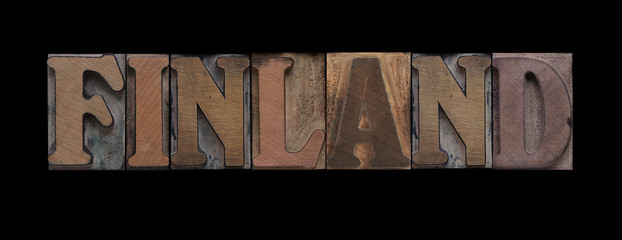 the word Finland in old letterpress wood type