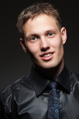 smiley man over dark background