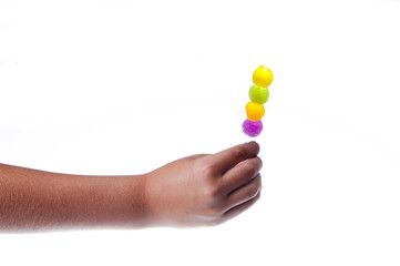 Jelly lollipop in the child hand