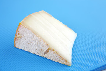 ight swiss cheese on blue