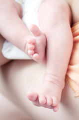 Obraz na płótnie Canvas Closeup of baby feet