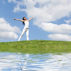 happy young woman dreams to fly on winds