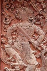 Fototapeta na wymiar art on window of temple, Wat Kwan Muang, Borabue, Mahasarakam