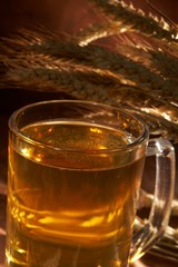 Glass of beer with grain