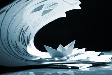 Business concept, paper boat and tsunami documents - obrazy, fototapety, plakaty