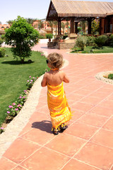 young girl in yellow Pareo
