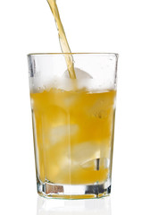 glass of orange juice with ice