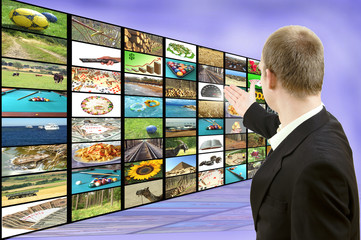 Businessman showing screen