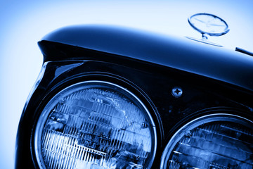 vintage car headlight close up