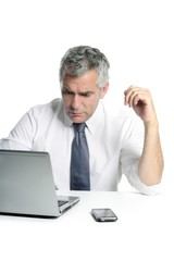 businessman senior gray hair working laptop